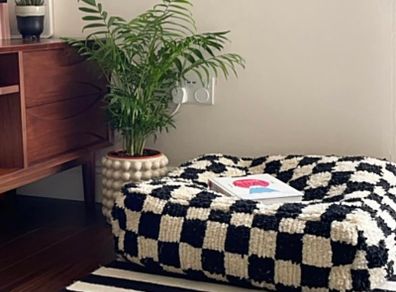 Moroccan style checkerboard pouffe
