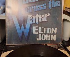 Elton John - Madman ax]cross the Water