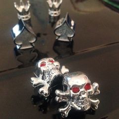 Motorcycle chrome valve caps.