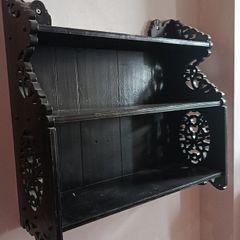Carved wooden wall shelves