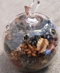 Glass apple potpourri holder