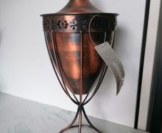 Copper-finished metal outdoor garden oil torch or tabletop tiki-style torch with a wick and stand