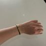 Calvin Klein black and gold bangle Image 2