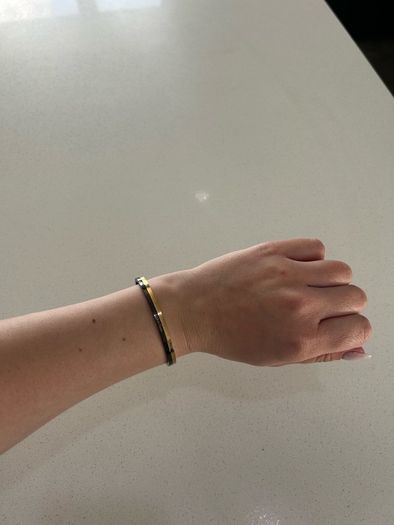 Calvin Klein black and gold bangle