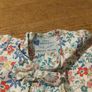 Young Dimension floral print baby dress with a small bow detail at the neckline. New with tags. Image 3