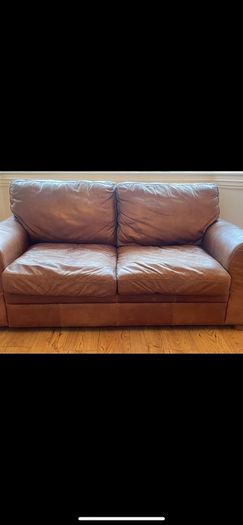 brown leather couches x 2 - will sell separately 650 each