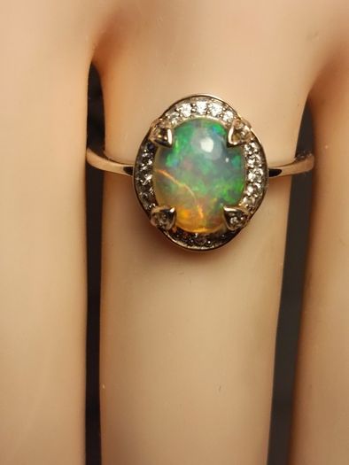 Ethiopian Welo Opal and Lab Grown Diamond Oval Cluster Ring.