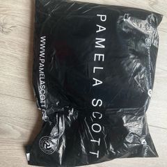 Pamela Scott never worn