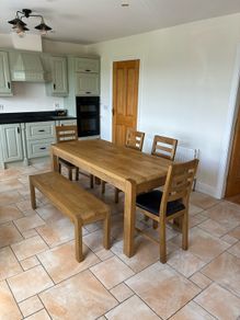 Solid Oak dining table and chairs