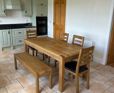 Solid Oak dining table and chairs