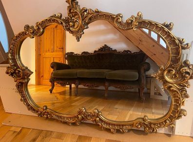 Elegant ornate gold toned oval wall mirror