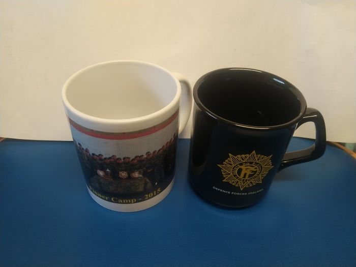 Two Irish Defence Forces mugs