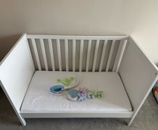cot bed with mattress and remote toy