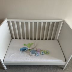 cot bed with mattress and remote toy