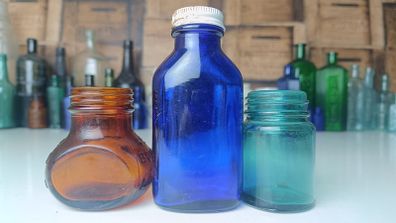 457 - Set of Three Beautiful Vintage Glass Decorative Collectible Bottles - Amber Eire Bovril, Cobalt Blue Magnesia and Turquoise Science Cream