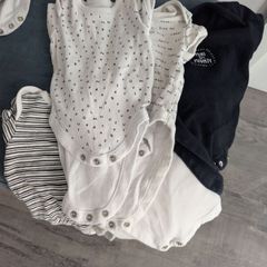 Six newborn vests