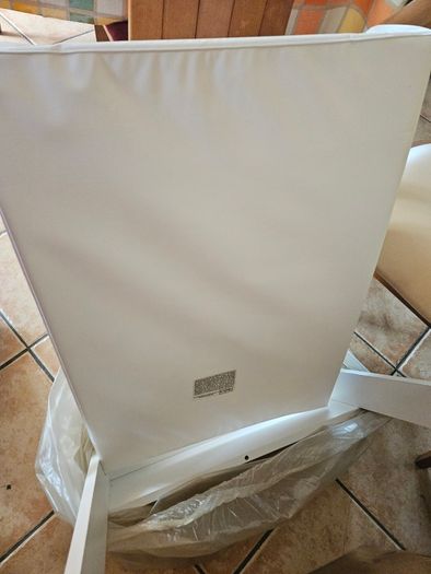 Cot top changer with firm sided changing mat
