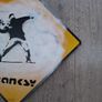 Banksy Sheet Metal Reproduction Road Sign of The Flower Bomber Image 3