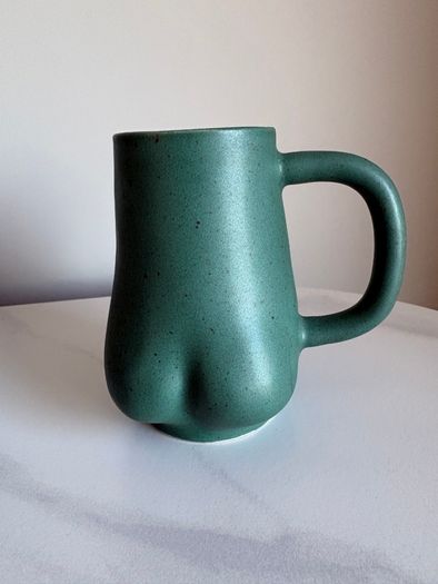 Curvy female figure ceramic mug