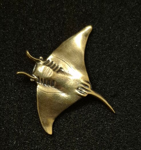 3 brass fish.