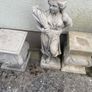 Four stone garden statues Image 5