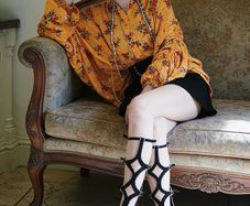 Artistic oversized floral blouse in a warm golden yellow tone
