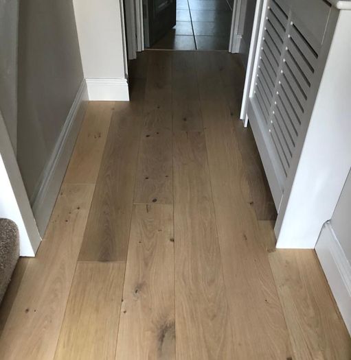 Laminated wood floor fitting