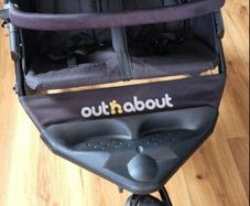 Out n about double buggy with raincover