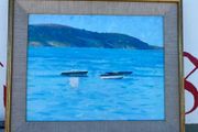 Seascape depicting small boats moored in a calm harbour with hills in the background unsigned
