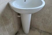 Corner bathroom sink