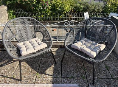 Pair of woven garden chairs