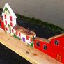 rustic wooden floating shelf display featuring a hand-painted village scene Image 8