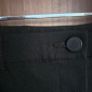 Black skinny trousers featuring contrast white side stripes, size 8 Image 5