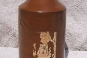 Stoneware antique ink bottle (large size 7.5" high) - made by Joseph Bourne of Denby (1880's - 1910's). Superb condition with remnants of label.