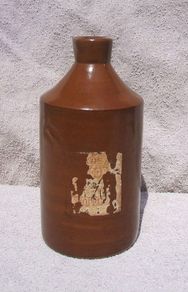 Stoneware antique ink bottle (large size 7.5" high) - made by Joseph Bourne of Denby (1880's - 1910's). Superb condition with remnants of label.