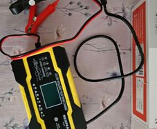 Charger for motorbike or e-scooter battery