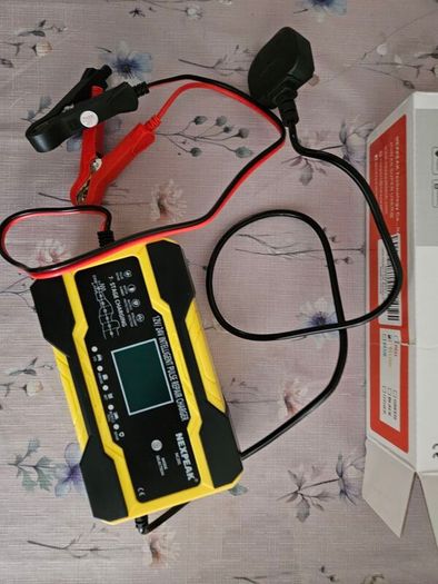 Charger for motorbike or e-scooter battery