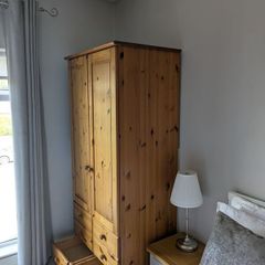 solid pine wardrobe with drawers.