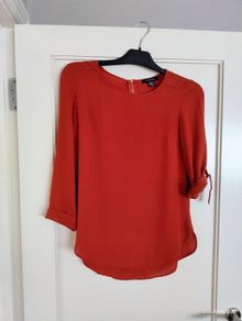 women's rust 3/4 length sleeve top