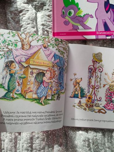 bundle of 7 story books in Polish Hard Cover Like New