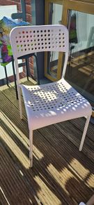 White Ikea chair for balcony or garden