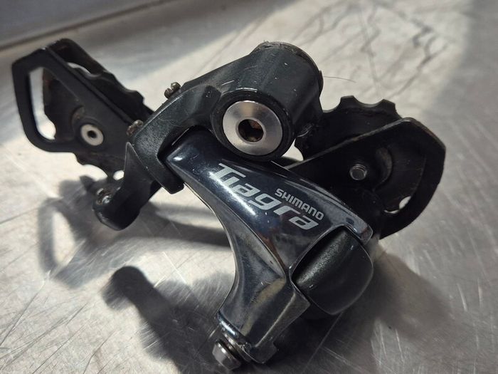 Shimano Tiagra RD-4700 10-speed rear derailleur.