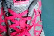 Grey and pink Nike down shifter trainers