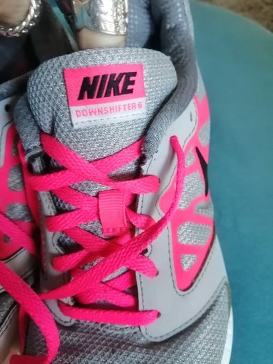 Grey and pink Nike down shifter trainers