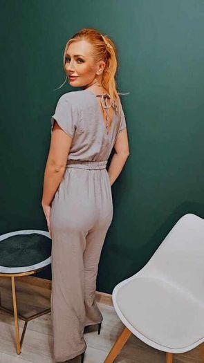 Jumpsuit with a decorative belt and tied back
