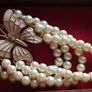 A beautiful faux pearl butterfly bracelet. Image 4