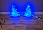 2 blue plug in Christmas trees.