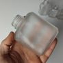 311 - Set of 4 Vintage Decorative Collectible Clear Glass Bottles Image 2