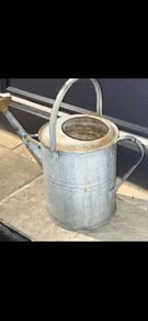 old zinc watering can
