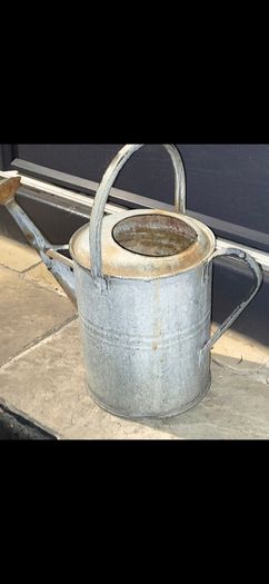 old zinc watering can